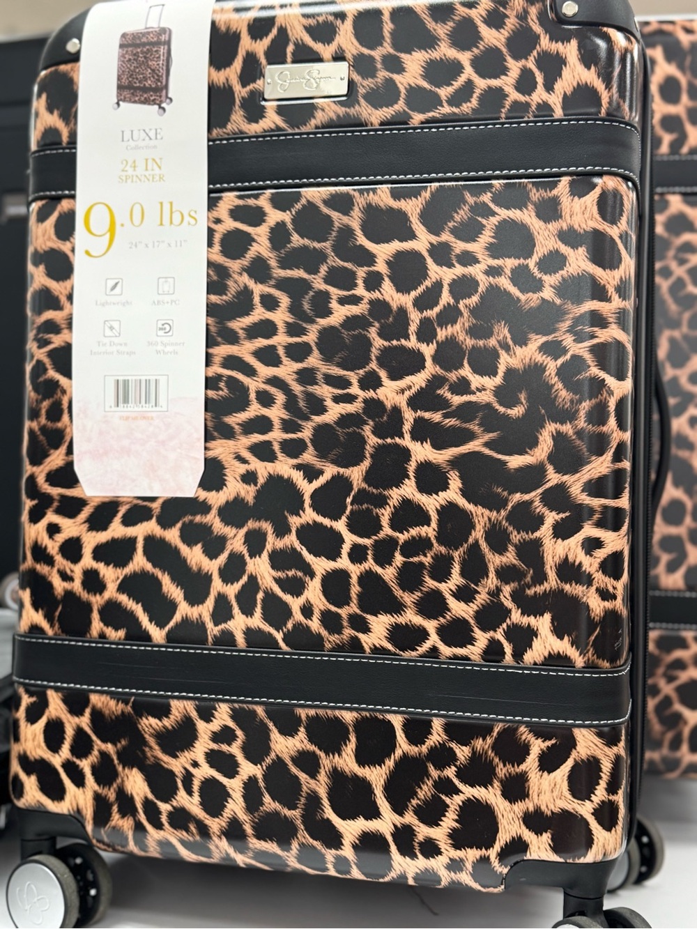 Jessica Simpton 24" Spinner Luggage - Leopard Print